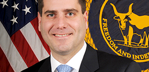 Suffolk County District Attorney Timothy D. Sini to Deliver Touro Law Commencement Address Logo