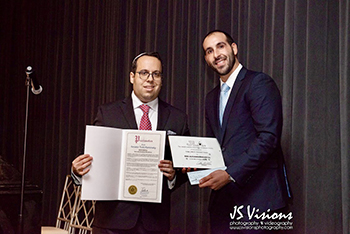 Seen here, President of JLA, Gene Rosen, presents the scholarship award to Touro Law student Sina Nazmiyal at JLA's annual Installation Dinner. 
Photo by J.S. Visions Photography